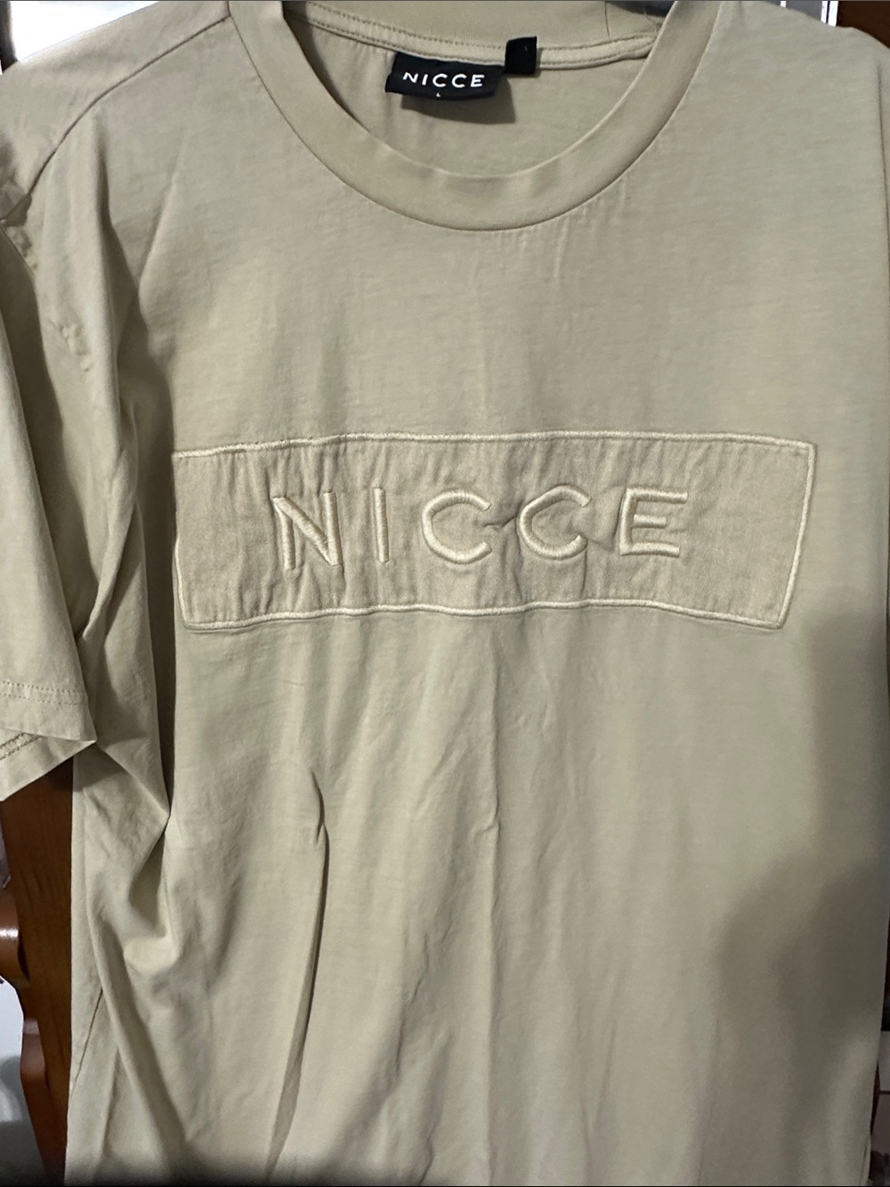 NICCE Mercury T-Shirt, lifestyle piece featuring prominent,embroidered box logo